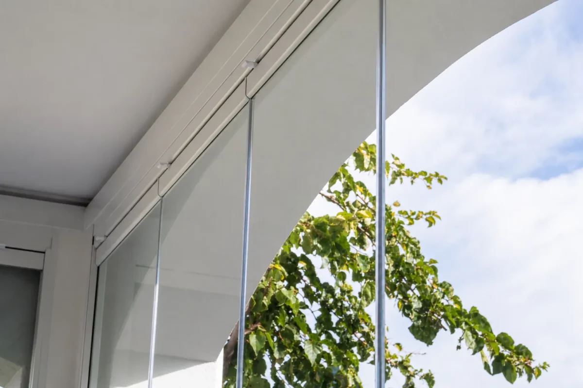 How to Keep Frameless Glass Looking Crystal Clear All Year